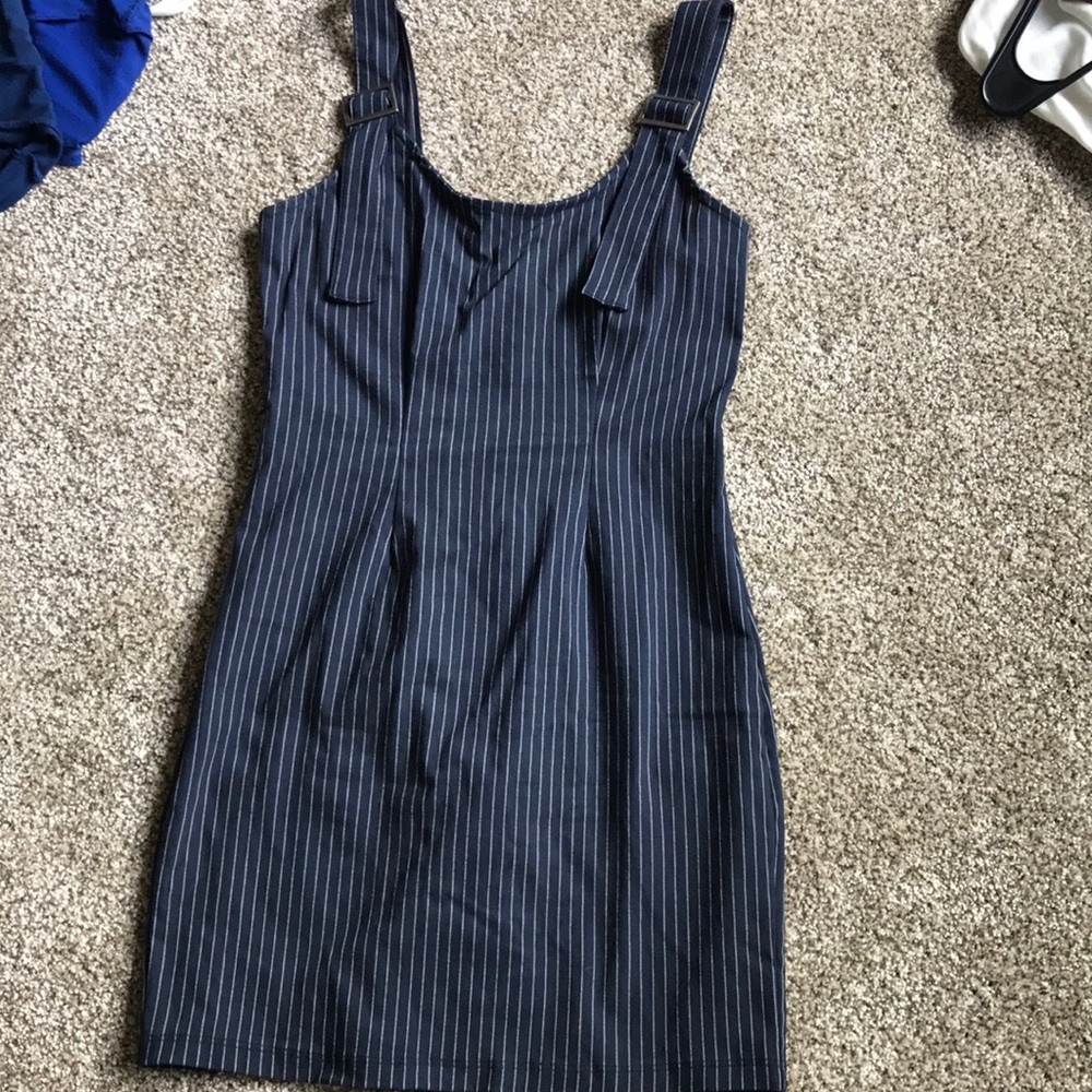 Curve hugging stripe dress. Only worn once
